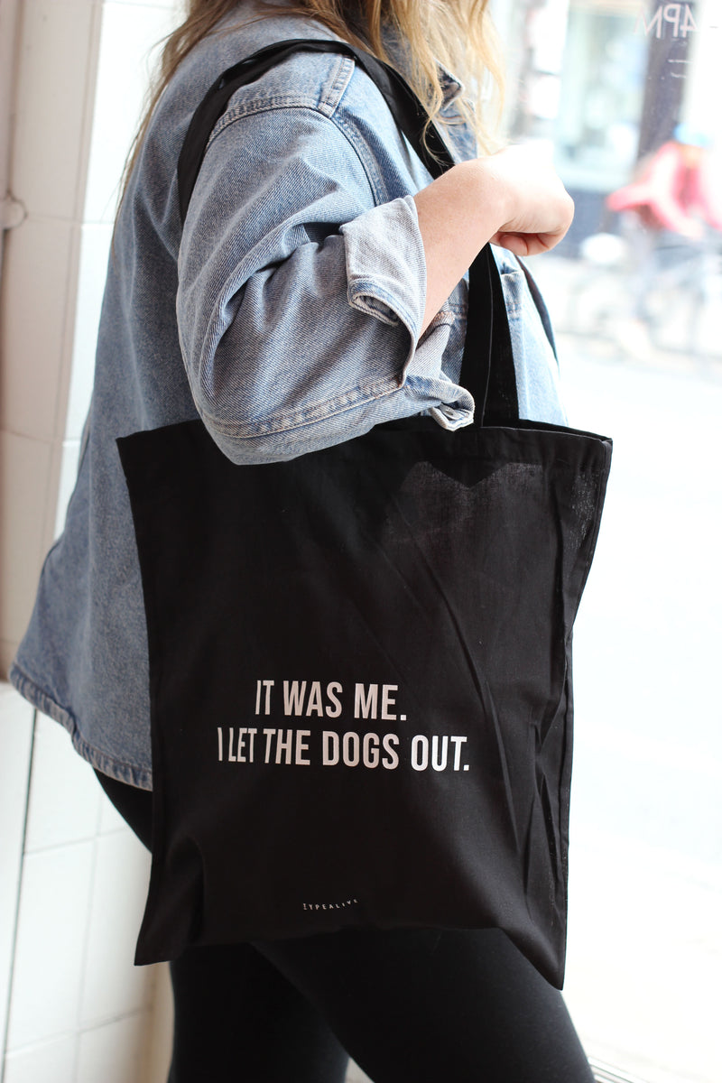 It was me. I let the Dogs Out Tote Bag